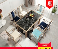 大理石北欧餐桌椅组合现代简约小户型轻奢长方形金色铁艺饭桌椅子