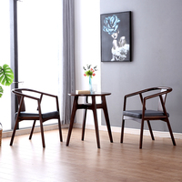 新中式椅子北欧现代圈椅接待洽谈椅设计师创意靠背椅真皮实木餐椅